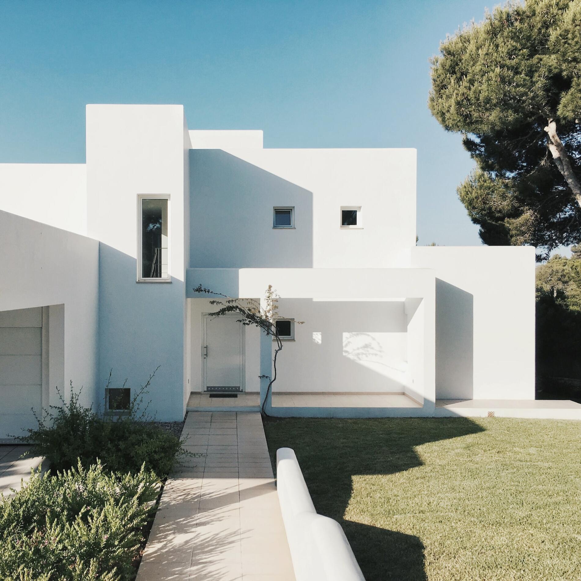 a white house with a flat roof